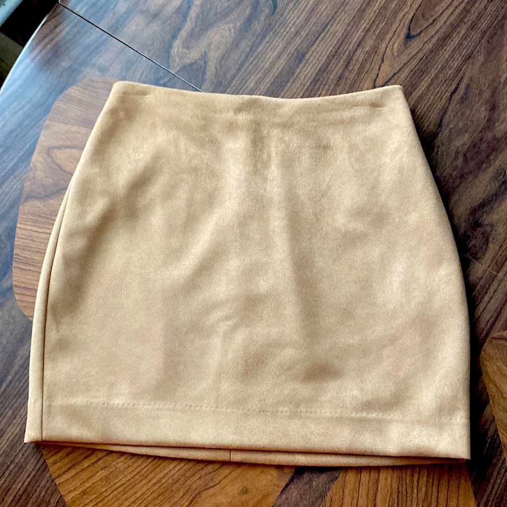 Brown high rise mini skirt.